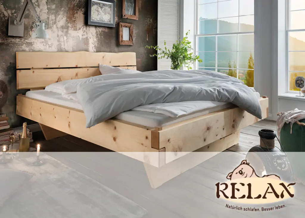 Hochwertiges Massivholzbett in hellem Holz mit natürlichem Design. Schlafzimmermöbel von RELAX stehen für ergonomischen Schlafkomfort, Natürlichkeit und ein gesundes Raumklima.